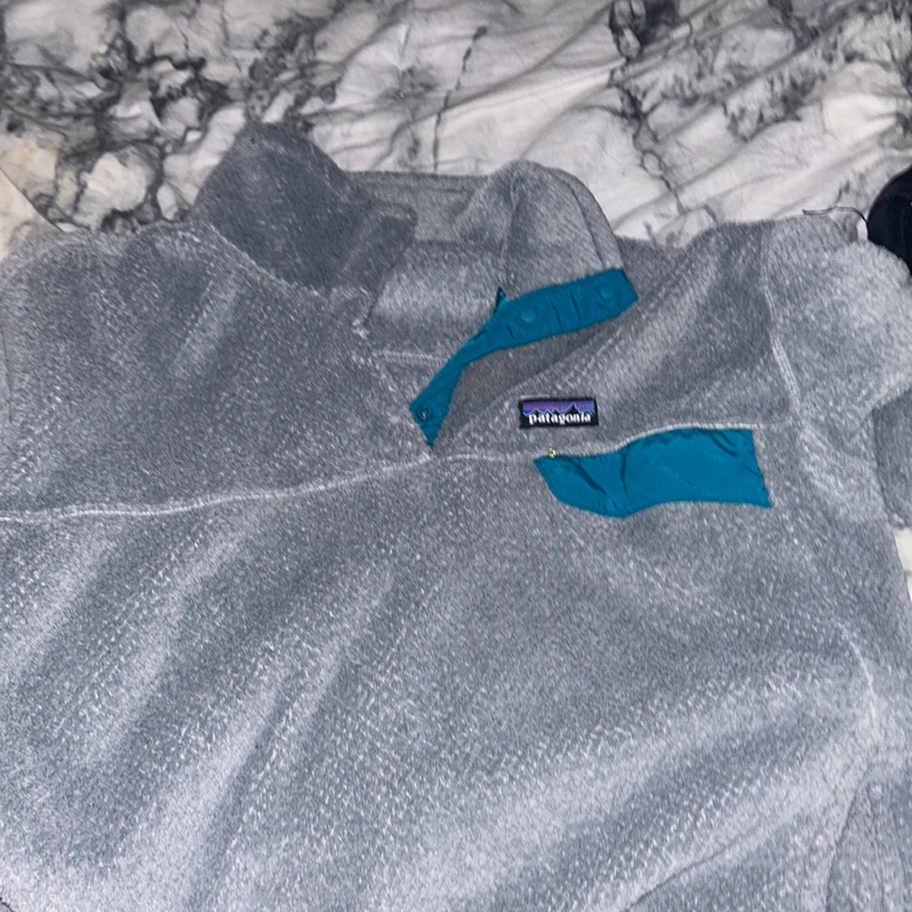 Patagonia jacket there is a stain but it’s very small